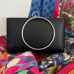 Beautiful black clutch with gold ring handle